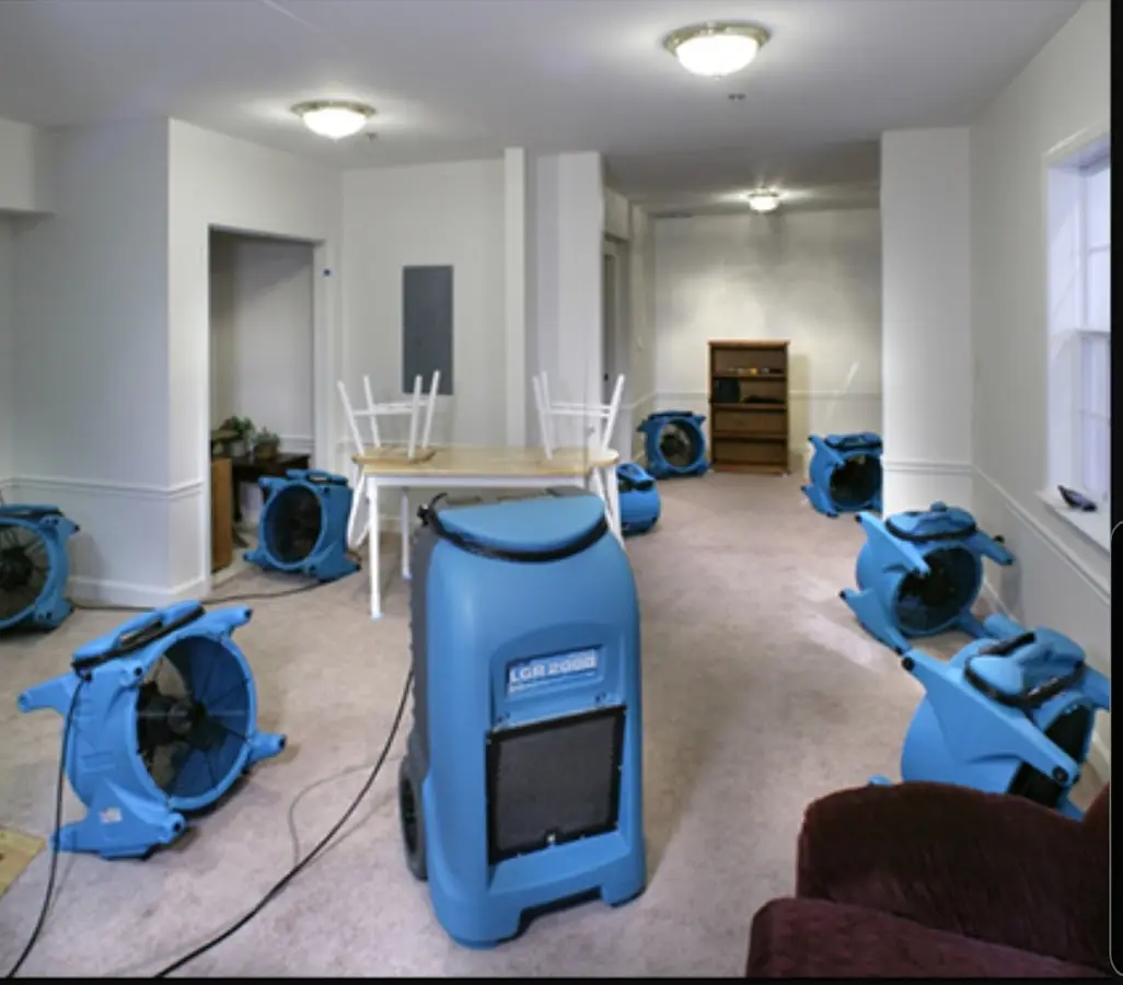 Air movers and dehumidifier setup for Water Damage Restoration in Ladue